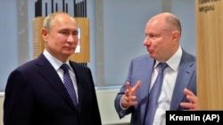 Владимир Потанин (справа) с Владимиром Путиным, 2019